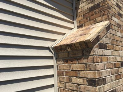 Exterior insulated Premium Vinyl Siding Vertical Board Batten Siding Vinyl Vented Soffit Custom Trim Gutters in Lisle