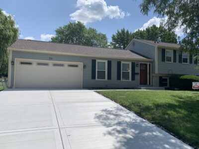 5 Star Highly Reviewed Professional Contractor completes home exterior renovation with new siding, windows, patio and main entry door at 111 Paxton Lane in Schaumburg, IL